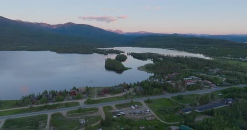 Drone shot pushing in on Shadow Mountain Lake at sunset in Colorado