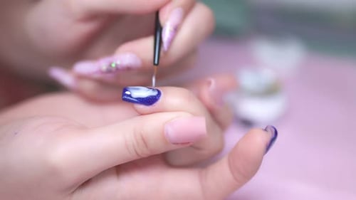 Expert Nail Painting Close Up Shot of Manicurist's Personal Care Ritual