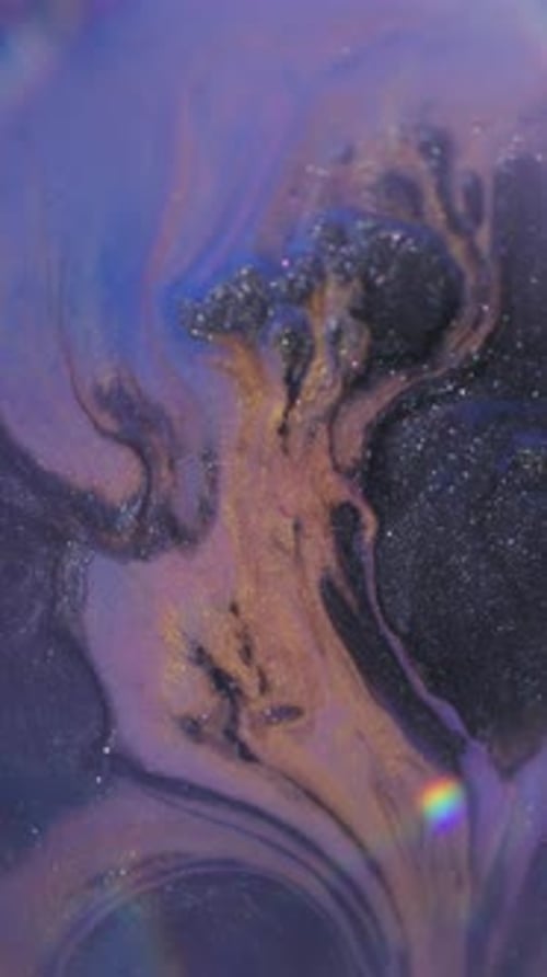 Fluid Art: Abstract Mixing of Golden Liquid