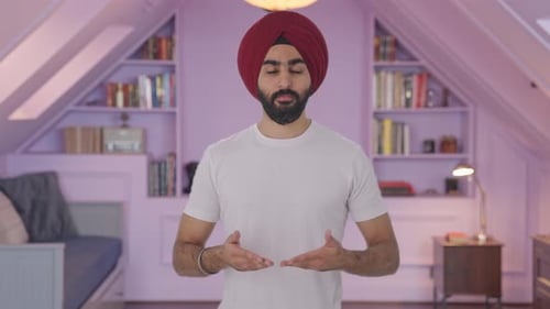 Young Adult in Turban Talking to the Camera