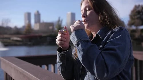 tired of smoking cigarettes Woman smoking cigarette at the park, Medical Stock Footage ft. woman & park tired of smoking cigarettes Woman smoking cigarette at the park, Medical Stock Footage ft. woman & park