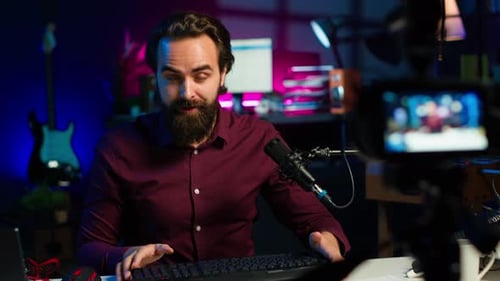 Young Adult Vlogger Presents Computer Gear