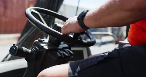 Logistics, operator and hands with steering wheel in forklift, supply chain