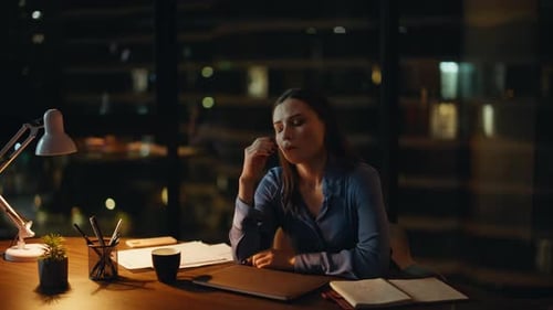 Unmotivated Employee Closing Laptop at Night Business Office Tired Woman