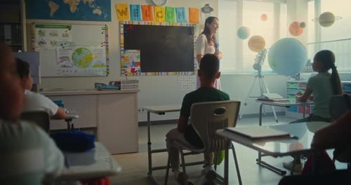 STEM Class Beautiful Female Teacher Starting Lesson Educating Geography to Elementary School