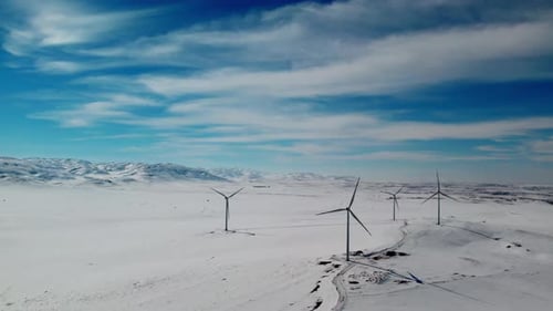 Wind Turbine In Snowy Winter