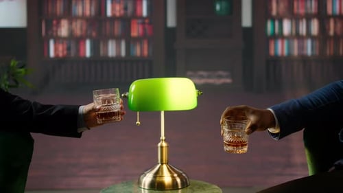 Business People Toasting in Library Setting