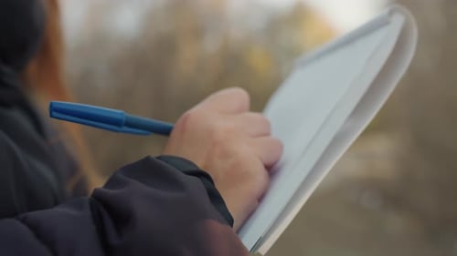 Writing in Journal Amid Nature Individual Recording Observations on Walk Person Skillfully Taking