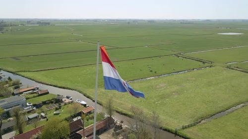 Aerial view of Dutch flag in top of a church with kingsday, Netherlands