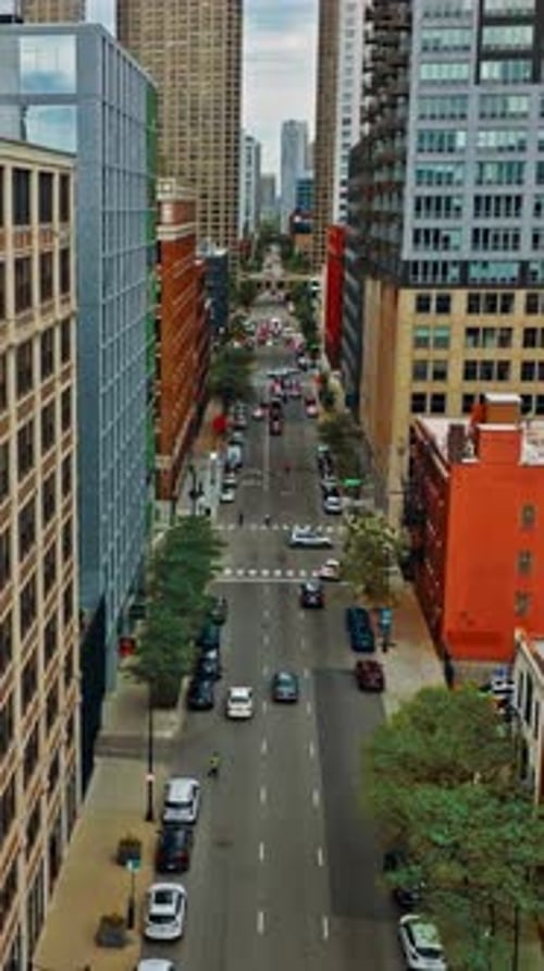 Aerial view of city streets in downtown Chicago revealing urban activity