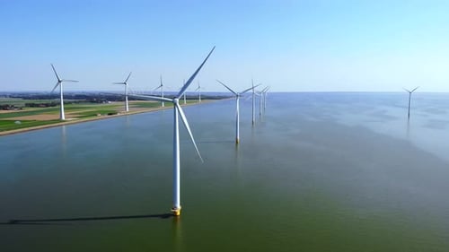 Windmill Turbines at Sea Seen From a Drone Aerial View From Abov
