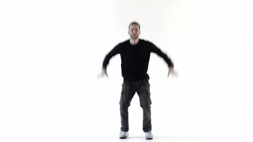 Male Dancer Performing Creative Routine in White Studio
