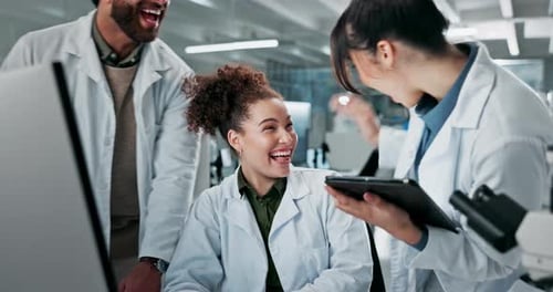 Scientists Collaborate and Celebrate Successful Research in Lab