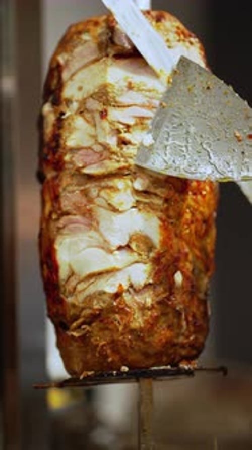 Juicy Meat for Shawarma on Vertical Grill Street Food Concept