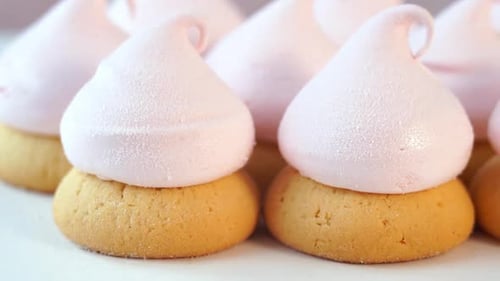 Camera Movement of Close Up of Pink Cake with Berry Marshmallows Meringue Cake