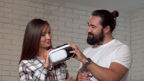 Woman Tries Virtual Reality Headset with Friend