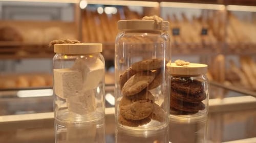Cookies and Marshmallows in Jars on Bakery Display