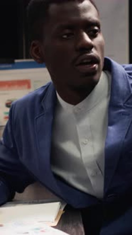 Colleagues Reviewing Documents in a Modern Office