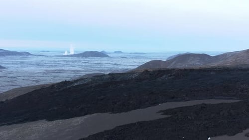 Solidified basalt lava river going downhill on hillside of Fagradalsfjall area, Iceland