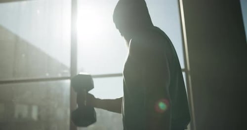 Fitness, man and dumbbells with weightlifting at gym for strength training