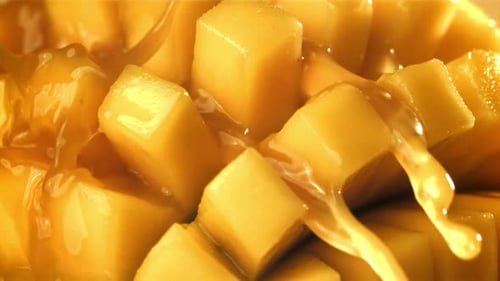 Sweet Mango Chunks Covered in Syrup