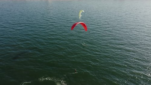 Group of Kite Surfers Doing Tricks in the Baltic Sea at Sunset Gdansk Poland