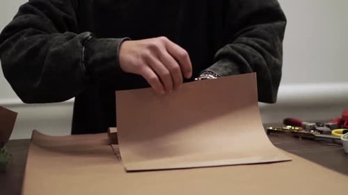 Careful Paper Folding and Gift Wrapping Process
