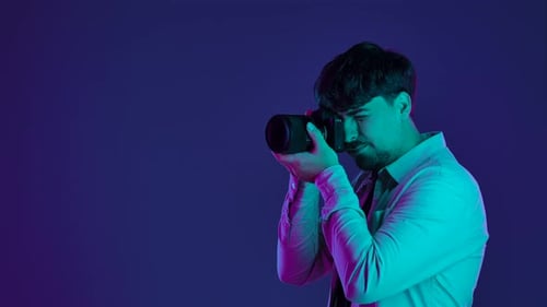 Backstage Photographer in Studio Shooting with Camera