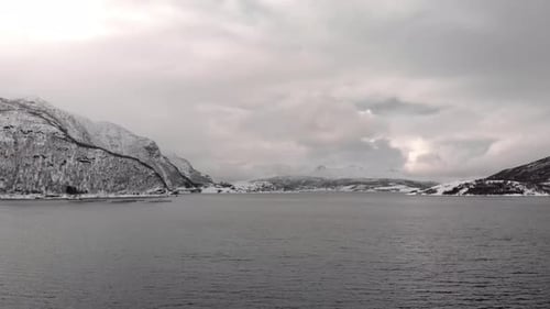 Drone shot of mountains in Tromso, Norway during winter