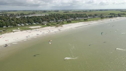 Aerial view of kitesurfing extreme sport with the wind at lake, Netherlands