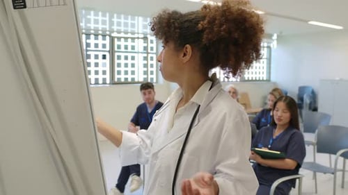 Healthcare Professional Presenting to Students in a Classroom