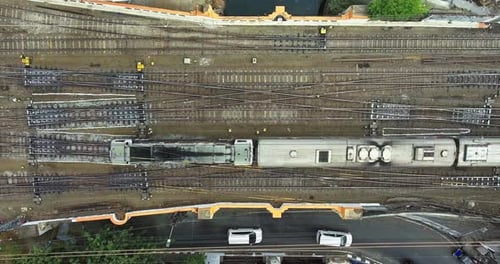 Jakarta, 17 August 2019, Aerial view top shot train passing crane up camera