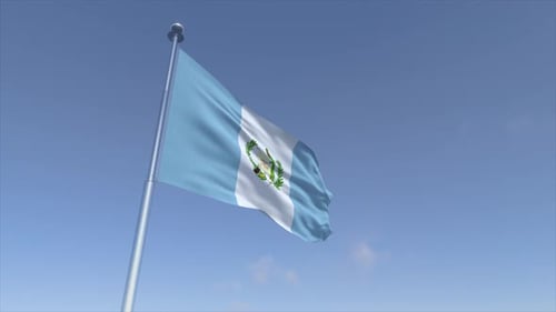 Guatemala National Flag Waving in Bright Blue Sky