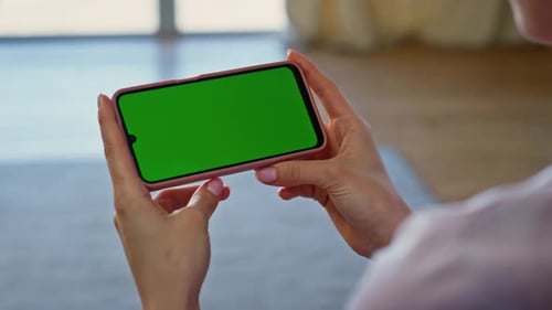 Hands Holding Green Screen Smartphone Home Closeup Unknown Girl Looking Gadget