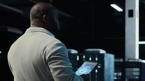 Server Room Software Developer Troubleshooting Errors Using Software