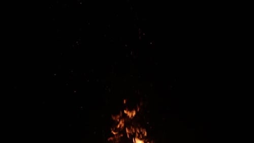 Flames burning into the night sky overlay