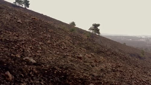 Aerial View of Fire-Damaged Rural Hillside Landscape