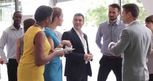Business executives shaking hands at a networking event