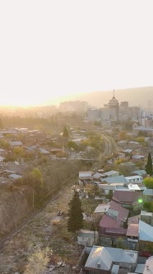 Vertical Video Aerial Panorama Tbilisi Georgia's Most Beautiful Autumn Cityscape