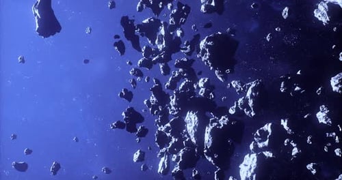 Asteroids Drift Through the Vast Emptiness of Space in a Cosmic Show