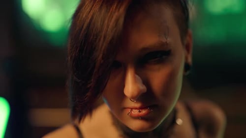 Intense Young Adult with Piercings Close Up