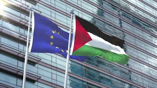 European Union And Palestine Flags Waving Against Modern Building