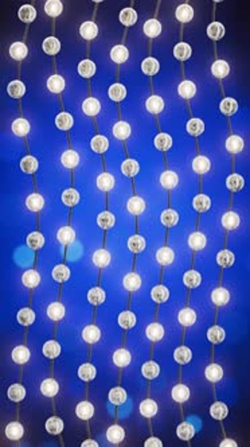 Elegant Glowing String Lights with Bokeh Background