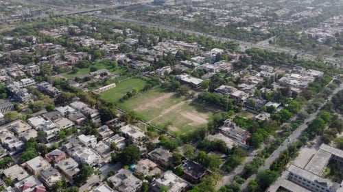 Aerial View of a Bustling Neighborhood in Pakistan Highlighting the Blend of Urban Development and