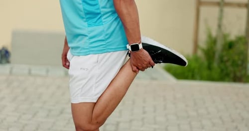 Man stretching legs, fitness and running outdoor, ready for run and exercise