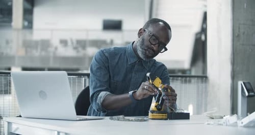 Female working on robotics
