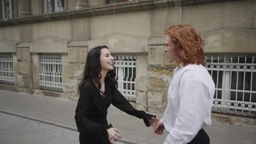 Friends Meet and Dance on Urban Street