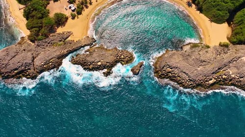 Tropical beach coastline aerial view with crashing waves