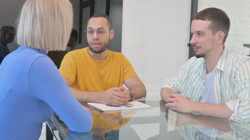 Close up of Mixed Race Man Talking with Teammates