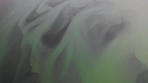 Aerial view of water formation at river estuary, Akurey, Iceland.